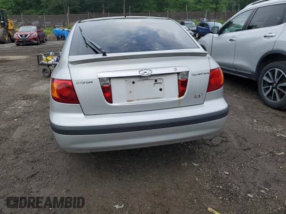 2002 Hyundai Elantra GT z VIN KMHDN55D52U056342, wystawiony jako Copart lot #57234115 z przebiegiem 162 652 mil mil oraz Szkoda całkowita • Salvage title. Historia ofert i sprzedaży dostępna na DreamBid. Obrazek 6.