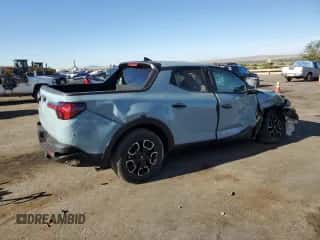 2022 Hyundai Santa Cruz SEL z VIN 5NTJB4AE0NH018798, wystawiony jako Copart lot #72095624 z przebiegiem 19 097 mil mil oraz Szkoda całkowita • Salvage title. Historia ofert i sprzedaży dostępna na DreamBid. Obrazek 3.