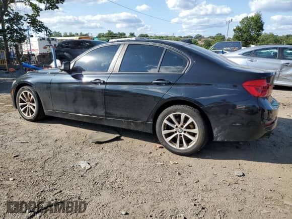 2018 BMW 3 Series 320i xDrive with VIN WBA8E5G57JNU46425, listed as a Copart auction lot 68207245 with 84,689 mi miles and Salvage title. Bid and sale history available at DreamBid. Image 2.