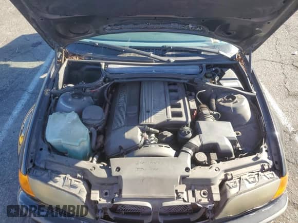 1999 BMW 3 Series 323i с VIN WBAAM3331XKC56081, выставлен на аукционе Copart как лот 82767554 с пробегом 92 916 миль миль и Списание • Salvage title. История ставок и продаж доступна на DreamBid. Изображение 11.