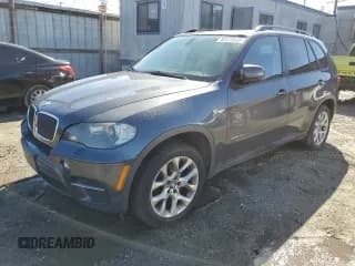 ✅ 2011 BMW X5 35i • VIN: 5UXZV4C58BL742802 • Lot: 82475585. Listed on Copart with 209,979 mi. Free auction sales archive from the USA and detailed vehicle history report at DreamBid. Image 1.