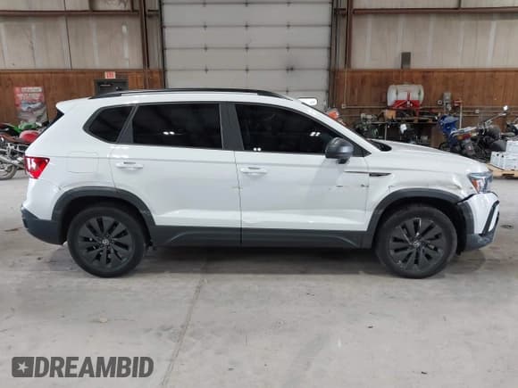 ✅ 2022 Volkswagen Taos S • VIN: 3VVAX7B29NM078578 • Лот: 42887530. Опубликован ранее на IAAI с пробегом 73 592 миль. Бесплатный доступ к архиву аукционных продаж из США и подробный отчёт об истории автомобиля на DreamBid. Изображение 13.