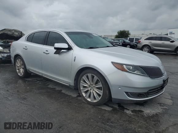 ✅ 2014 Lincoln MKS EcoBoost • VIN: 1LNHL9FT4EG600658 • Lot: 70491155. Listed on Copart with 101,441 mi. Free auction sales archive from the USA and detailed vehicle history report at DreamBid. Image 4.