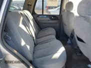 ✅ 2005 GMC Envoy SLE • VIN: 1GKDT13S452194933 • Lot: 41426512. Listed on IAAI with 176,897 mi. Free auction sales archive from the USA and detailed vehicle history report at DreamBid. Image 8.