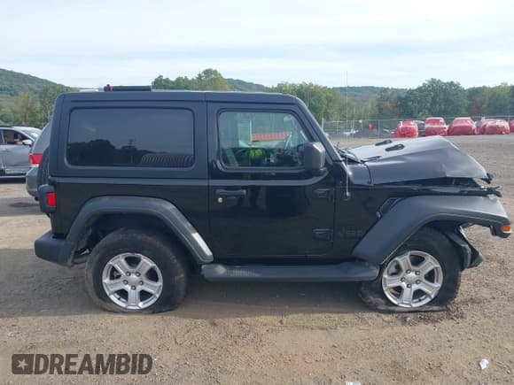 ✅ 2022 Jeep Wrangler Willys • VIN: 1C4GJXAN0NW152542 • Lot: 43302104. Listed on IAAI with 52,419 mi. Free auction sales archive from the USA and detailed vehicle history report at DreamBid. Image 14.