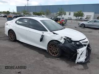 2023 Toyota Camry SE with VIN 4T1G11BKXPU103411, listed as a IAAI auction lot 43192965 with 14,378 mi miles and . Bid and sale history available at DreamBid. Image 1.