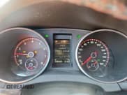 ✅ 2014 Volkswagen Golf GTI Wolfsburg Edition • VIN: WVWGD7AJ2EW008012 • Lot: 71723355. Wystawiony na Copart z przebiegiem 148 088 mil. Bezpłatny archiwum sprzedaży aukcyjnych z USA i szczegółowy raport historii pojazdu na DreamBid. Zdjęcie 9.