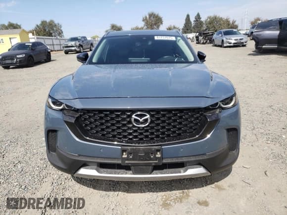 ✅ 2023 Mazda CX-50 Premium Plus • VIN: 7MMVABEY5PN100430 • Lot: 81737675. Wystawiony na Copart z przebiegiem 44 444 mil. Bezpłatny archiwum sprzedaży aukcyjnych z USA i szczegółowy raport historii pojazdu na DreamBid. Zdjęcie 5.