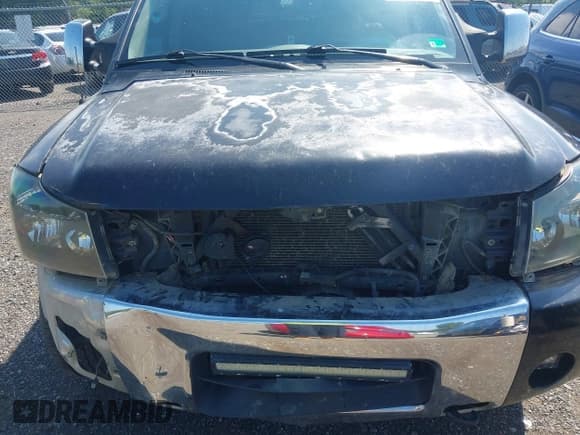 ✅ 2005 Nissan Titan LE • VIN: 1N6AA07B05N509859 • Lot: 42662424. Listed on IAAI with 252,000 mi. Free auction sales archive from the USA and detailed vehicle history report at DreamBid. Image 6.