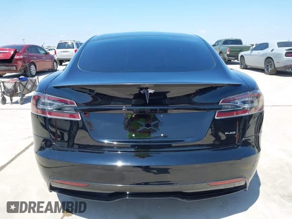 ✅ 2021 Tesla Model S Plaid • VIN: 5YJSA1E65MF439632 • Lot: 43166263. Listed on IAAI with 38,565 mi. Free auction sales archive from the USA and detailed vehicle history report at DreamBid. Image 16.