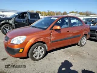 ✅ 2009 Kia Rio LX • VIN: KNADE223396488342 • Lot: 76982024. Listed on Copart with 123,113 mi. Free auction sales archive from the USA and detailed vehicle history report at DreamBid. Image 1.