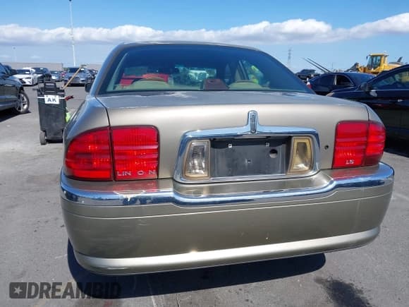 ✅ 2001 Lincoln LS Sport • VIN: 1LNHM86S31Y714332 • Лот: 42238079. Опубликован ранее на IAAI с пробегом 74 152 миль. Бесплатный доступ к архиву аукционных продаж из США и подробный отчёт об истории автомобиля на DreamBid. Изображение 16.