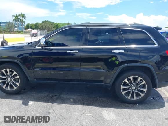 2018 Jeep Grand Cherokee Limited z VIN 1C4RJEBG7JC353475, wystawiony jako IAAI lot #43057910 z przebiegiem 87 674 mil mil oraz . Historia ofert i sprzedaży dostępna na DreamBid. Obrazek 14.