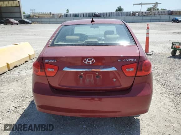 2010 Hyundai Elantra GLS z VIN KMHDU4AD9AU117127, wystawiony jako Copart lot #65379854 z przebiegiem 215 182 mil mil oraz Szkoda całkowita • Salvage title. Historia ofert i sprzedaży dostępna na DreamBid. Obrazek 6.
