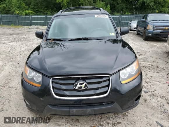 2011 Hyundai Santa Fe SE с VIN 5XYZHDAG7BG059711, выставлен на аукционе Copart как лот 67062364 с пробегом 175 804 миль миль и Списание • Salvage title. История ставок и продаж доступна на DreamBid. Изображение 5.