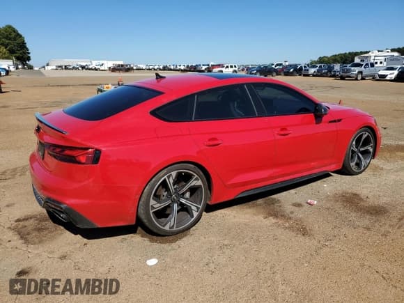 ✅ 2022 Audi RS 5 Sportback • VIN: WUAAWCF57NA901099 • Лот: 85764915. Опубликован ранее на Copart с пробегом 37 522 миль. Бесплатный доступ к архиву аукционных продаж из США и подробный отчёт об истории автомобиля на DreamBid. Изображение 3.