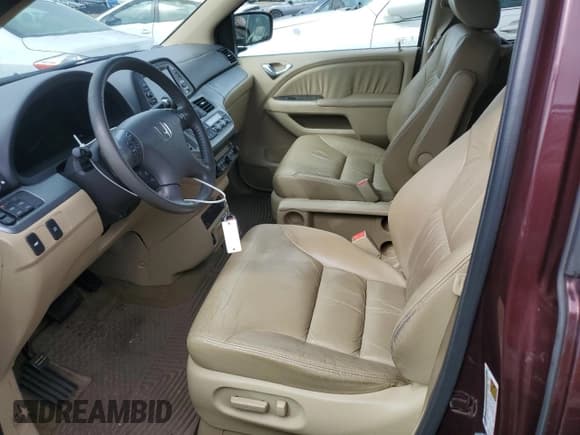 ✅ 2010 Honda Odyssey EX-L • VIN: 5FNRL3H77AB060572 • Lot: 82253525. Listed on Copart with 95,772 mi. Free auction sales archive from the USA and detailed vehicle history report at DreamBid. Image 7.