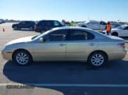 ✅ 2002 Lexus ES 300 • VIN: JTHBF30G920059121 • Lot: 43483694. Listed on IAAI with 122,377 mi. Free auction sales archive from the USA and detailed vehicle history report at DreamBid. Image 14.