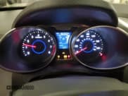 ✅ 2014 Hyundai Veloster • VIN: KMHTC6AD4EU190387 • Lot: 46918985. Wystawiony na Copart z przebiegiem 96 350 mil. Bezpłatny archiwum sprzedaży aukcyjnych z USA i szczegółowy raport historii pojazdu na DreamBid. Zdjęcie 9.