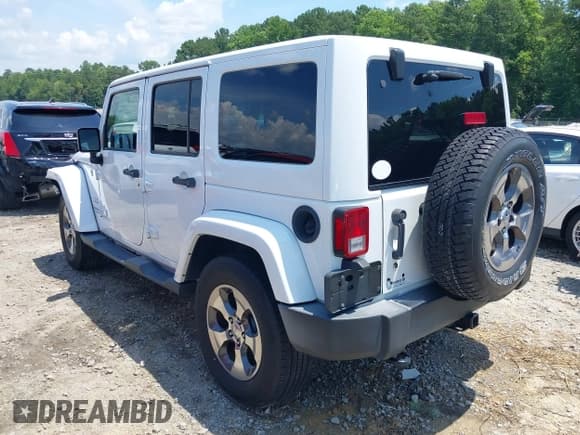 ✅ 2018 Jeep Wrangler Unlimited Sahara • VIN: 1C4BJWEG3JL805263 • Lot: 42593276. Listed on IAAI with 96,489 mi. Free auction sales archive from the USA and detailed vehicle history report at DreamBid. Image 3.