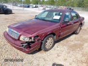 ✅ 2004 Ford Crown Victoria LX • VIN: 2FAFP74W54X101416 • Lot: 43256681. Listed on IAAI with 232,713 mi. Free auction sales archive from the USA and detailed vehicle history report at DreamBid. Image 2.