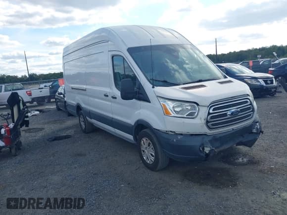 ✅ 2015 Ford Transit Cargo • VIN: 1FTSW3XG1FKA10268 • Lot: 43340537. Listed on IAAI with 100,869 mi. Free auction sales archive from the USA and detailed vehicle history report at DreamBid. Image 1.