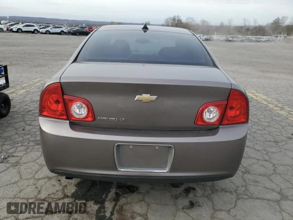 ✅ 2012 Chevrolet Malibu 1LT • VIN: 1G1ZC5E06CF144165 • Lot: 80795294. Listed on Copart with 131,459 mi. Free auction sales archive from the USA and detailed vehicle history report at DreamBid. Image 6.