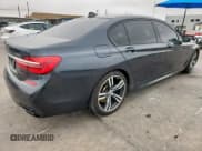 ✅ 2017 BMW 7 Series 740i • VIN: WBA7E2C34HG740975 • Lot: 71019405. Listed on Copart with 90,805 mi. Free auction sales archive from the USA and detailed vehicle history report at DreamBid. Image 3.