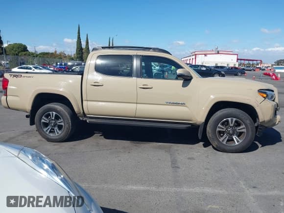 ✅ 2017 Toyota Tacoma TRD Sport • VIN: 3TMAZ5CN1HM039994 • Лот: 43364327. Опубликован ранее на IAAI с пробегом 74 523 миль. Бесплатный доступ к архиву аукционных продаж из США и подробный отчёт об истории автомобиля на DreamBid. Изображение 13.