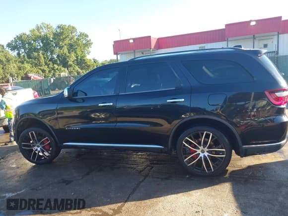 ✅ 2015 Dodge Durango Citadel • VIN: 1C4RDHEG4FC101078 • Lot: 43061596. Listed on IAAI with 198,769 mi. Free auction sales archive from the USA and detailed vehicle history report at DreamBid. Image 14.