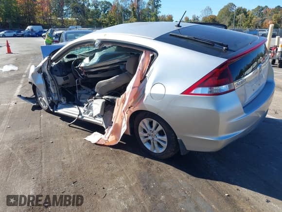 ✅ 2012 Honda Insight EX • VIN: JHMZE2H70CS000156 • Lot: 43483870. Listed on IAAI with Not provided. Free auction sales archive from the USA and detailed vehicle history report at DreamBid. Image 3.