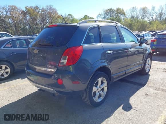 2013 Chevrolet Captiva Sport LTZ z VIN 3GNAL4EK4DS583921, wystawiony jako IAAI lot #43588792 z przebiegiem 127 331 mil mil oraz . Historia ofert i sprzedaży dostępna na DreamBid. Obrazek 4.