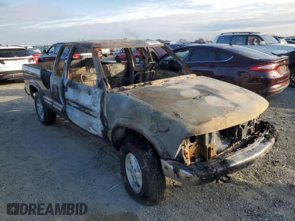 ✅ 2000 Chevrolet S-10 LS • VIN: 1GCDT19W1Y8212361 • Лот: 77343393. Опубликован ранее на Copart с пробегом Не указан. Бесплатный доступ к архиву аукционных продаж из США и подробный отчёт об истории автомобиля на DreamBid. Изображение 4.