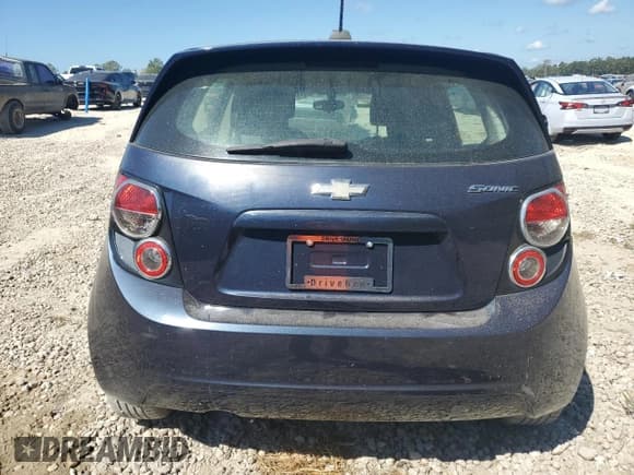 ✅ 2015 Chevrolet Sonic LS • VIN: 1G1JA6SH7F4136790 • Lot: 83853625. Listed on Copart with 129,316 mi. Free auction sales archive from the USA and detailed vehicle history report at DreamBid. Image 6.