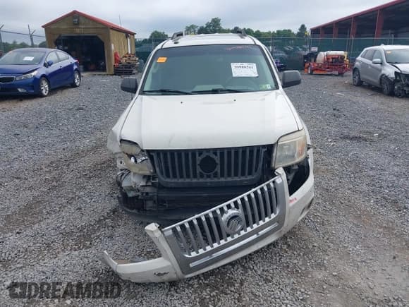 ✅ 2010 Mercury Mariner • VIN: 4M2CN8BG3AKJ22391 • Lot: 39988241. Listed on IAAI with 218,423 mi. Free auction sales archive from the USA and detailed vehicle history report at DreamBid. Image 12.
