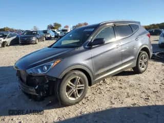 2017 Hyundai Santa Fe 2.4L z VIN 5NMZUDLB0HH033303, wystawiony jako Copart lot #86860325 z przebiegiem 55 047 mil mil oraz Szkoda całkowita • Salvage title. Historia ofert i sprzedaży dostępna na DreamBid. Obrazek 1.