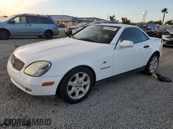 ✅ 2000 Mercedes-Benz SLK 230 Kompressor • VIN: WDBKK47F8YF169677 • Lot: 88743035. Listed on Copart with 141,680 mi. Free auction sales archive from the USA and detailed vehicle history report at DreamBid. Image 1.
