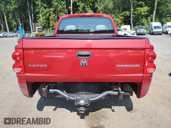 2009 Dodge Dakota ST z VIN 1D7HW28K49S816607, wystawiony jako Copart lot #71737454 z przebiegiem 112 378 mil mil oraz Szkoda całkowita • Salvage title. Historia ofert i sprzedaży dostępna na DreamBid. Obrazek 6.