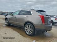 ✅ 2012 Cadillac SRX Performance Collection • VIN: 3GYFNBE37CS532590 • Lot: 94237585. Listed on Copart with 166,412 mi. Free auction sales archive from the USA and detailed vehicle history report at DreamBid. Image 2.