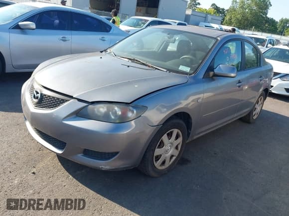 ✅ 2006 Mazda 3 i • VIN: JM1BK12G461466004 • Lot: 42515391. Listed on IAAI with 170,745 mi. Free auction sales archive from the USA and detailed vehicle history report at DreamBid. Image 2.