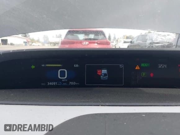 ✅ 2021 Toyota Prius LE • VIN: JTDKAMFP0M3179016 • Lot: 42204095. Listed on IAAI with 34,691 mi. Free auction sales archive from the USA and detailed vehicle history report at DreamBid. Image 7.