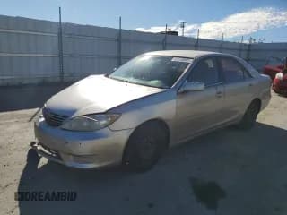 ✅ 2006 Toyota Camry LE • VIN: 4T1BE32K46U717248 • Лот: 91516095. Опубликован ранее на Copart с пробегом 197 892 миль. Бесплатный доступ к архиву аукционных продаж из США и подробный отчёт об истории автомобиля на DreamBid. Изображение 1.