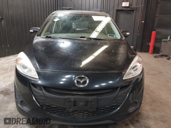 ✅ 2014 Mazda 5 Sport • VIN: JM1CW2BL5E0163023 • Lot: 42517864. Listed on IAAI with 129,483 mi. Free auction sales archive from the USA and detailed vehicle history report at DreamBid. Image 12.