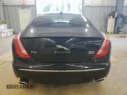 ✅ 2015 Jaguar XJ • VIN: SAJWJ1CD9F8V83885 • Lot: 65625135. Listed on Copart with 81,794 mi. Free auction sales archive from the USA and detailed vehicle history report at DreamBid. Image 6.