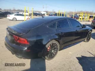 ✅ 2014 Audi RS 7 • VIN: WUAW2CFC1EN900894 • Лот: 47315655. Опубликован ранее на Copart с пробегом 107 429 миль. Бесплатный доступ к архиву аукционных продаж из США и подробный отчёт об истории автомобиля на DreamBid. Изображение 3.