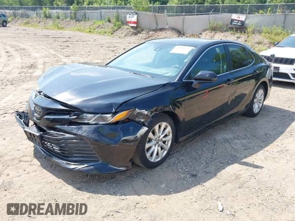 2019 Toyota Camry LE with VIN 4T1B11HK8KU203467, listed as a IAAI auction lot 42988134 with 116,947 mi miles and . Bid and sale history available at DreamBid. Image 17.