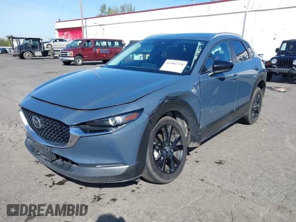 ✅ 2023 Mazda CX-30 S Carbon Edition • VIN: 3MVDMBCM1PM557862 • Lot: 41966734. Listed on IAAI with 36,757 mi. Free auction sales archive from the USA and detailed vehicle history report at DreamBid. Image 2.