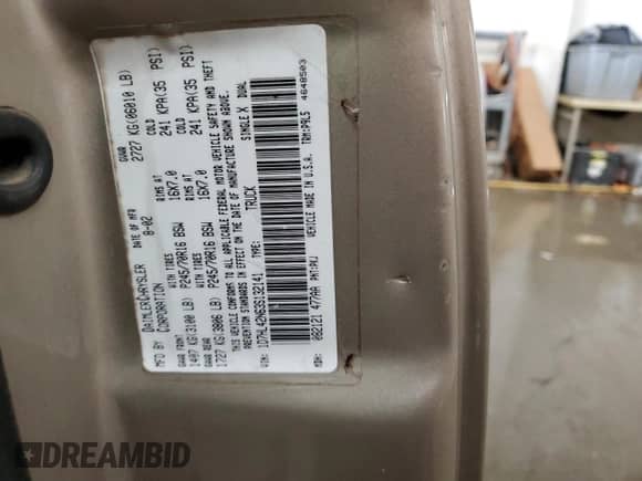 2003 Dodge Dakota SLT with VIN 1D7HL42N63S132141, listed as a Copart auction lot 56138235 with 219,246 mi miles and Salvage title. Bid and sale history available at DreamBid. Image 12.