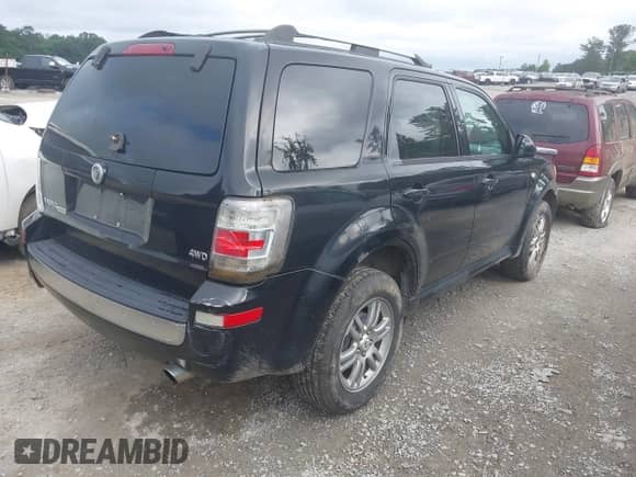 2009 Mercury Mariner Premier with VIN 4M2CU97749KJ15320, listed as a IAAI auction lot 42450753 with 182,172 mi miles and . Bid and sale history available at DreamBid. Image 4.