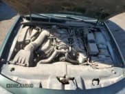 ✅ 1998 Lincoln Mark VIII • VIN: 1LNFM91V2WY629049 • Лот: 65560735. Опубликован ранее на Copart с пробегом 107 400 миль. Бесплатный доступ к архиву аукционных продаж из США и подробный отчёт об истории автомобиля на DreamBid. Изображение 11.